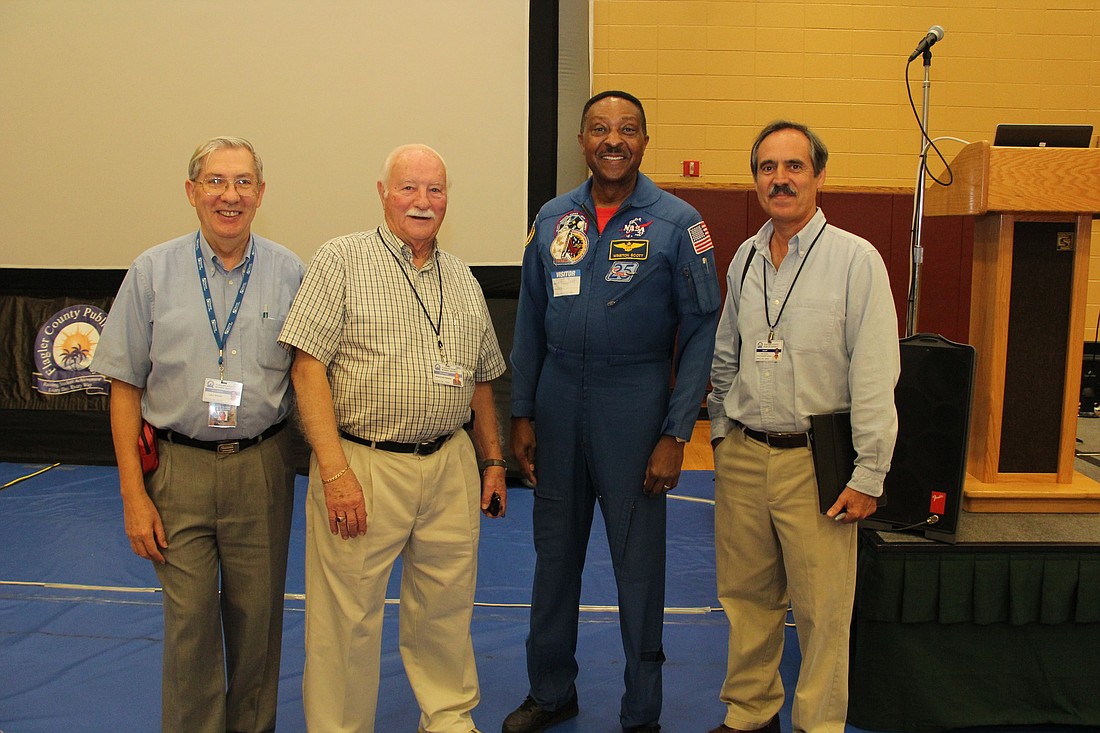 Lee Bentzley, Solar System Ambassador, Fred Pellmann, of the Palm Coast Astronomy Club, former NASA astronaut Winston Scott, and Jose Nunez, Flagler Schools STEM coordinator