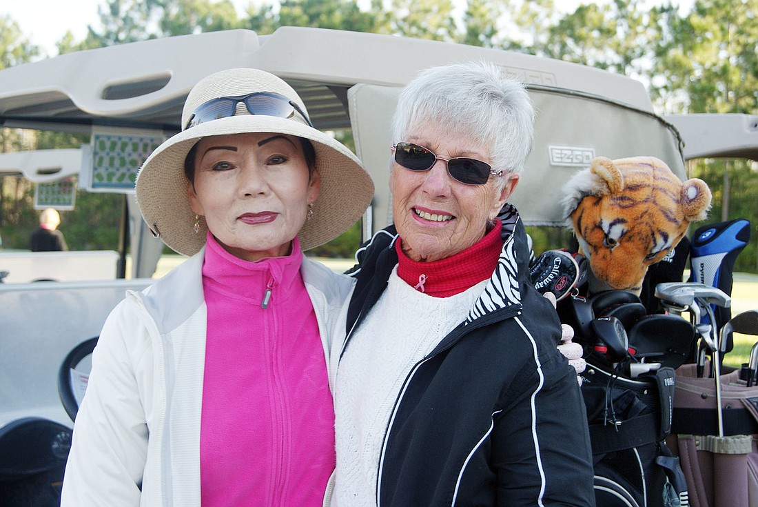 Shay Hall, pictured with Kay McCalla, won a golf bag after she was the closest to the pin on No. 13. COURTESY PHOTO