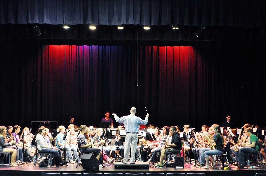 Fifty-six high school students from Flagler Palm Coast and Matanzas high schools rehearse Friday, March 16.