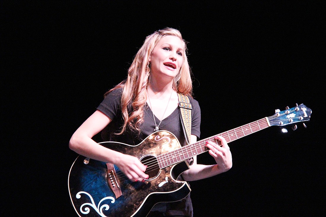 Abigail Recker, Miss FPC second runner-up, sang and played guitar during the talent portion of the contest.