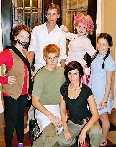 Back row, from left: Sydney Barksdal as Seneca Crane, Ryan Antos as Gale, Cassidy Wehde as Effie and Janessa Spina as Prim; front: Dillon Wehde as Peeta, and Chelsie Wehde as Katniss. COURTESY PHOTO