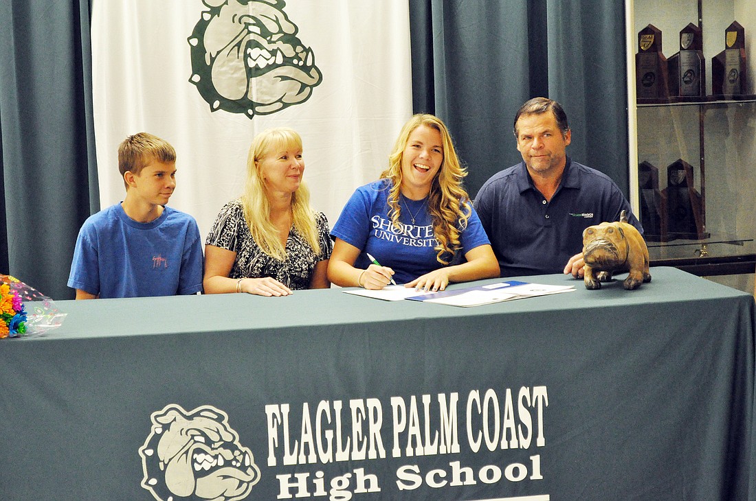 Haley Lademann (third from left) signed a scholarship to play college soccer at Shorter University, a NCAA Division II school in Rome, Ga. PHOTO BY ANDREW O'BRIEN