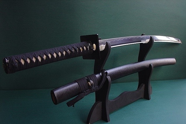 Kamil Mezalka stabbed his computer with a samurai sword when federal agents raided is home searching for child porn, according to a report. COURTESY PHOTO