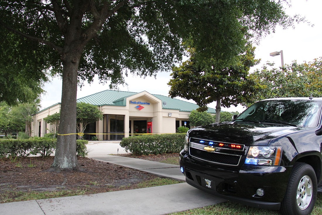The Bank of America, located on Cypress Branch Way and Palm Coast Parkway, was robbed around 11:17 a.m. Thursday. The robber is still on the run. //SHANNA FORTIER