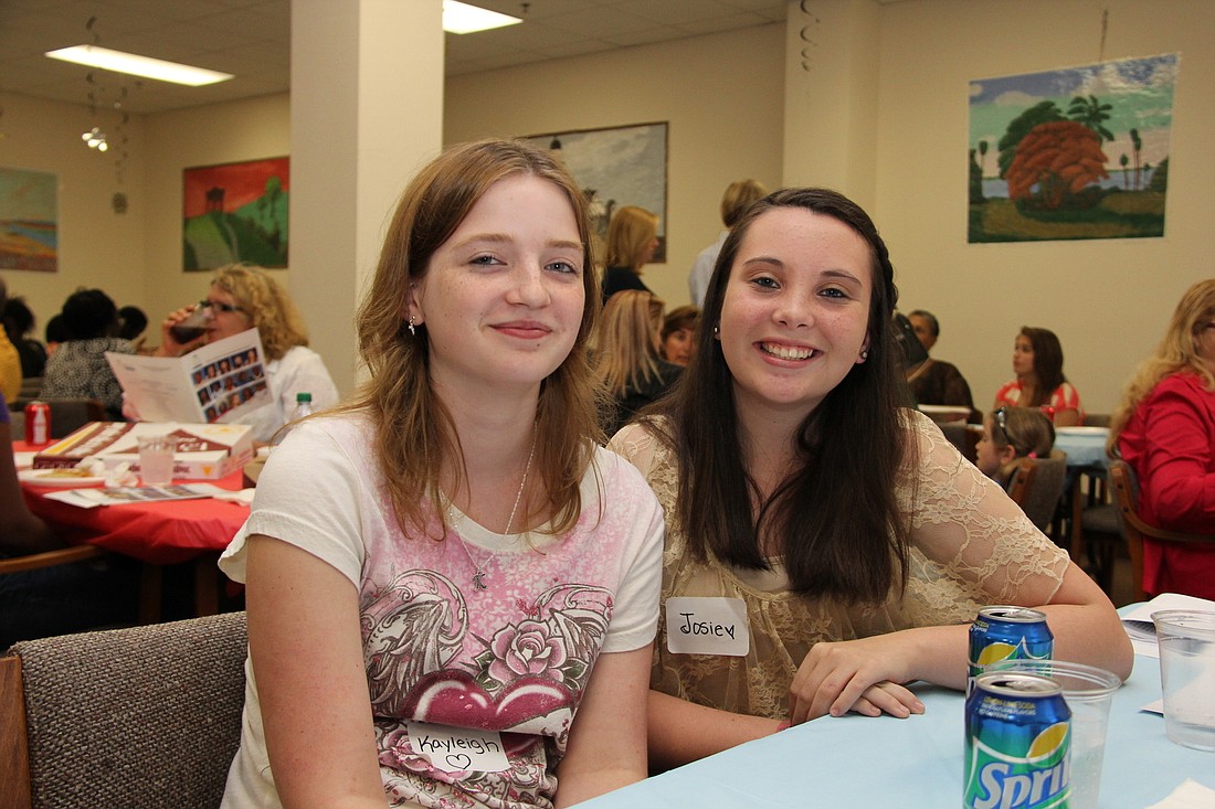 Kayleigh Bowen and Josie Brown are two eighth-grade students who received a four-year scholarship.