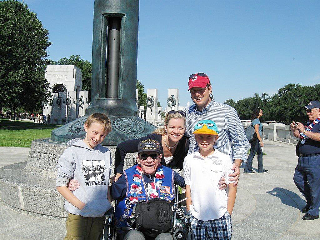 Joseph Hanzel, of Palm Coast, received a surprise visit byÃ‚Â his granddaughterÃ¢â‚¬â„¢s family at the WWII Memorial recently. COURTESY PHOTO