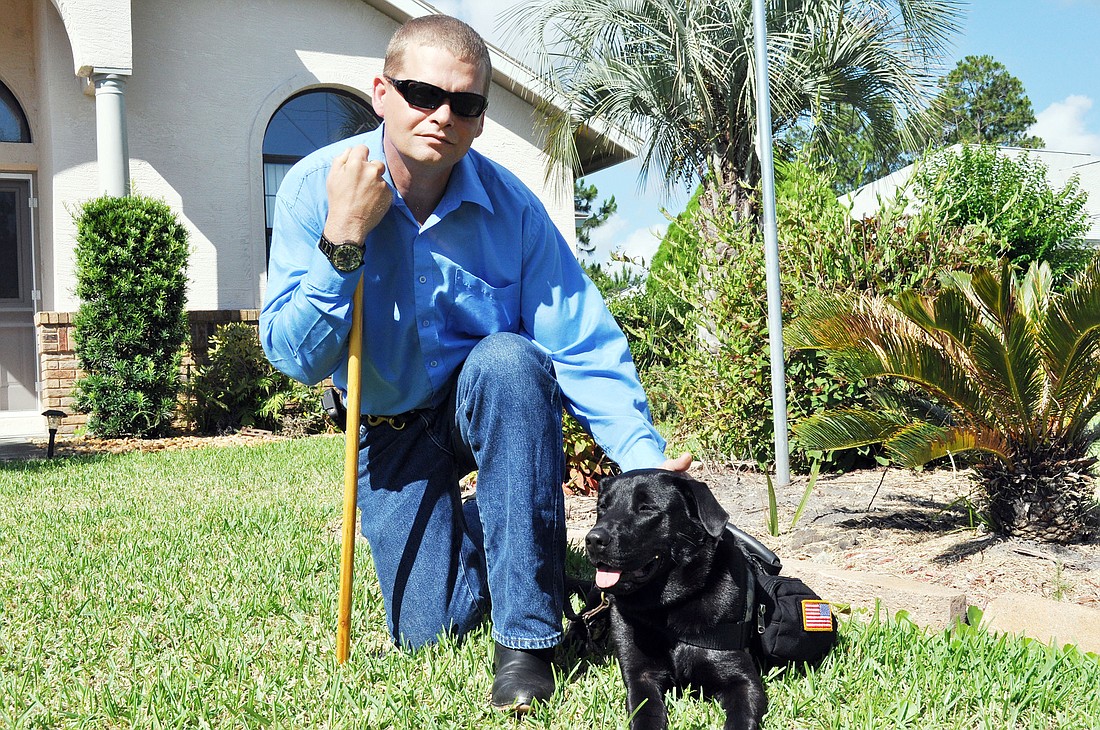 Sgt. Larry Stewart was paired up with 15-month-old Orion, a black Labrador mix, through the K-9s for Warriors program.