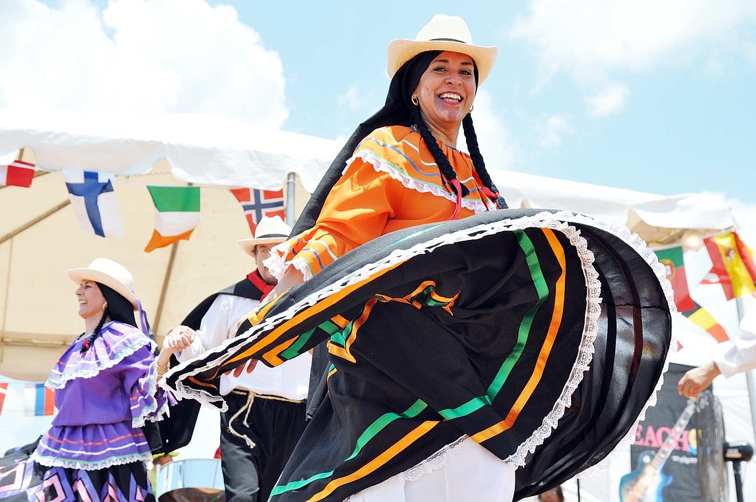 Ximena Klinge, of Jax 4 Couples, performs a traditional Colombian dance.