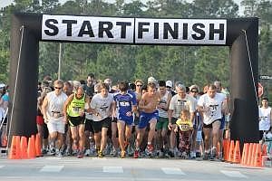 The race along the Palm Harbor Golf Club will feature both a two-mile run and a four-mile run. FILE PHOTO