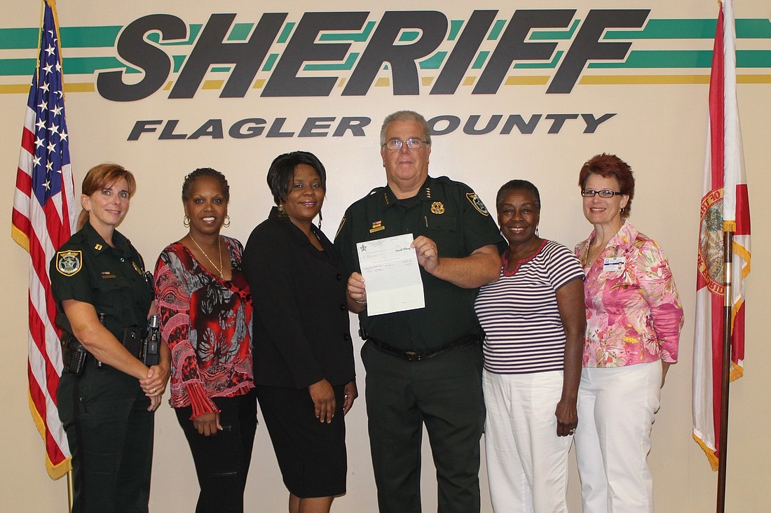 From left: Capt. Lynne Catoggio, Linda Hayward, Stephanie Ecklin, Sheriff Donald Fleming, Barbara Solomon and Katrina Townsend. COURTESY PHOTO