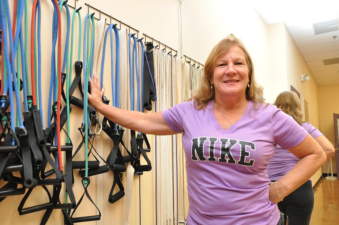 Eileen Curran, a 25-year P.E. and first-grade teacher, is also a year-round instructor at Anytime Fitness.