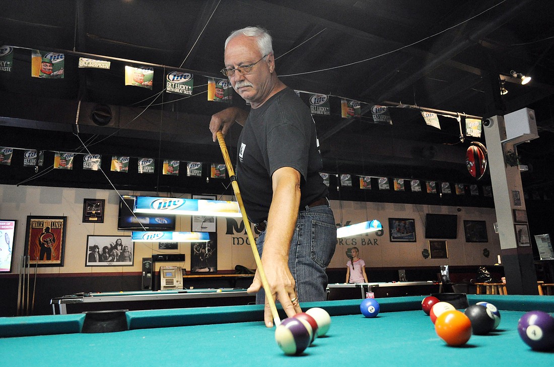 Ken Dunlop, league coordinator for Flagler CountyÃ¢â‚¬â„¢s Billiards Congress of America league. PHOTOS BY ANDREW O'BRIEN