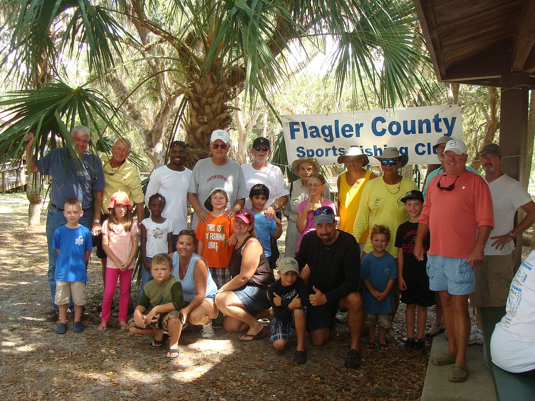 Fourteen kids and their parents were treated to a fishing outing.
