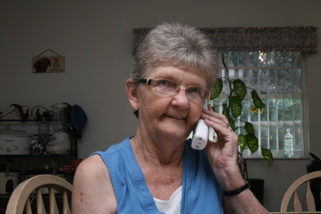 Karen Emmett Mills talks on the phone with her newly found half-sister, who lives in Ohio, every day. The two hope to meet in person sometime this year.