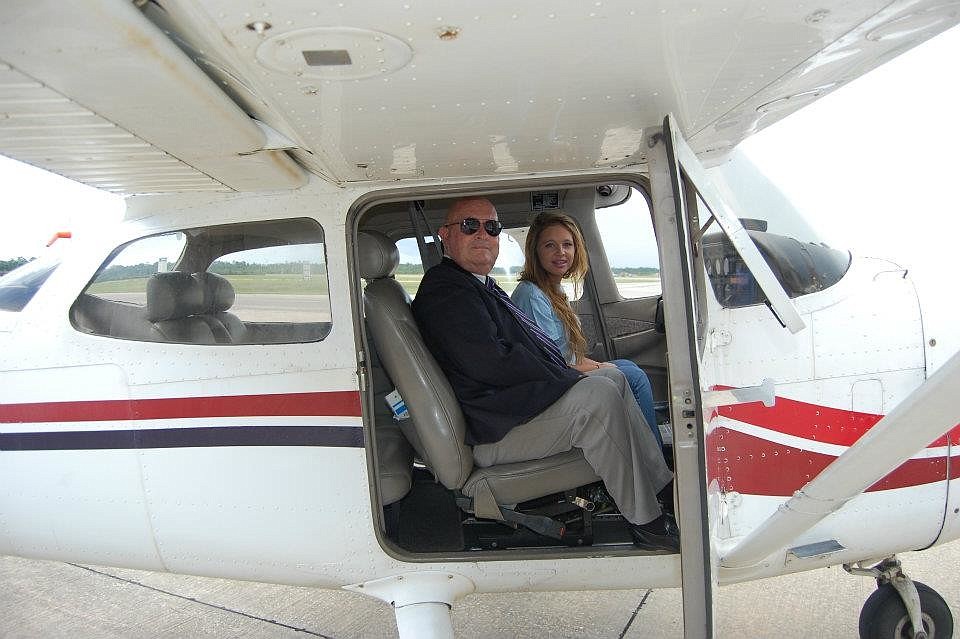 Col. Jack Howell and flight student Cora Jo Rand