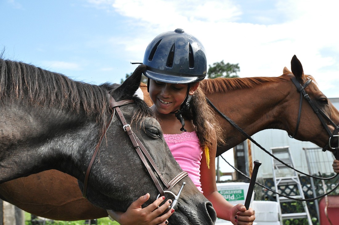Kalina Bent, 11, started riding at the same time her twin sister.