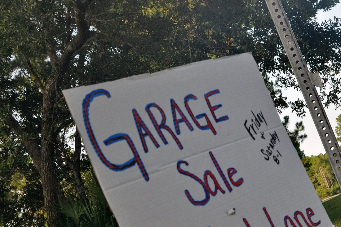 The City Council will now require residents to apply for a permit before having a garage sale. This will help code enforcement, officials say. FILE PHOTO