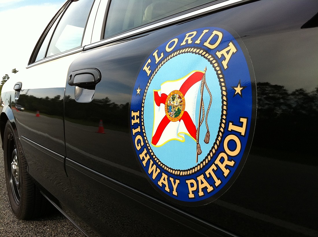 The driver lost control attempting to re-enter the left lane, and the motorcycle overturned, according to the Florida Highway Patrol.