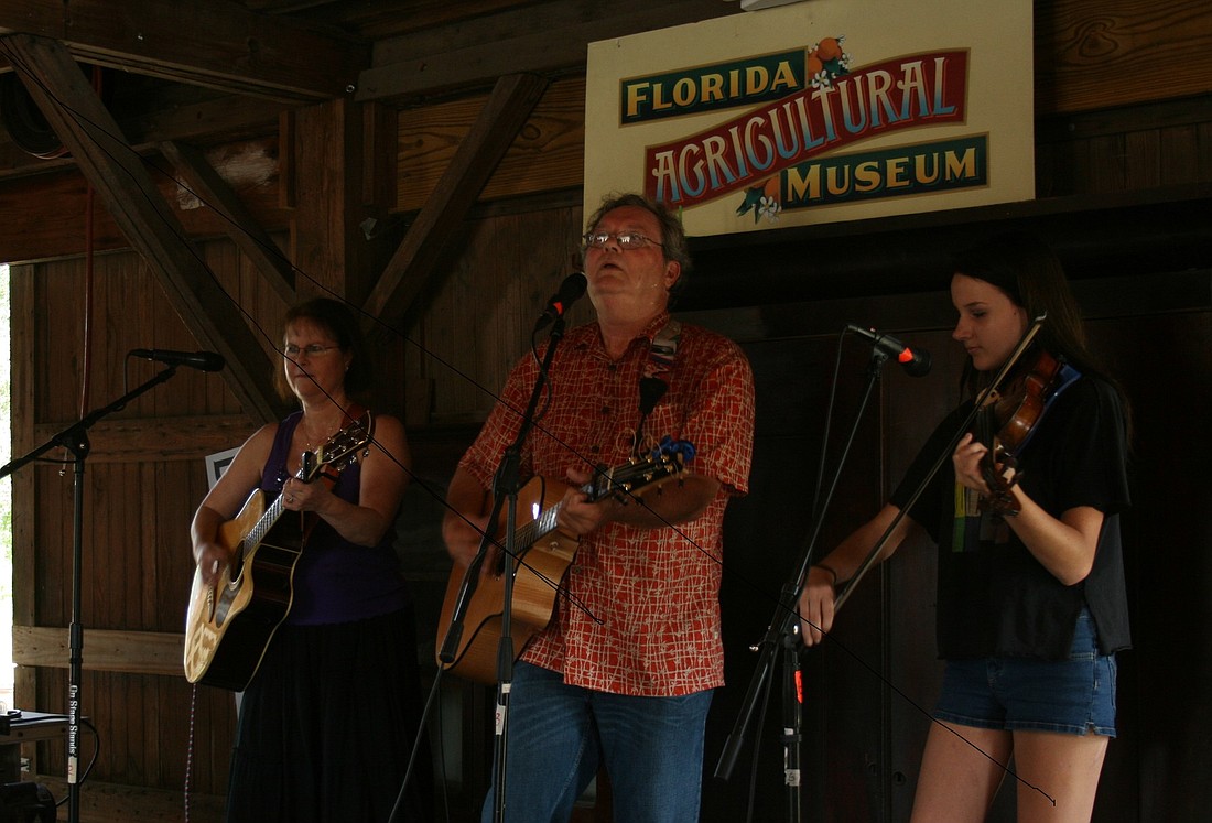 The band Ron and Mary plays a set on the festival's Bell Barn stage. Littered among the venue are vintage farm tools, pushed to the sides to make room for benches.