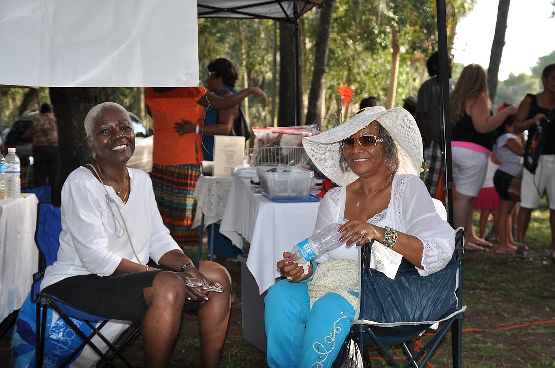 Delores Gomez (left) and Norma Daniels enjoy the festivities Saturday, Sept. 29, at the Caribbean Festival hosted by the United Caribbean Cultural Association of Palm coast.