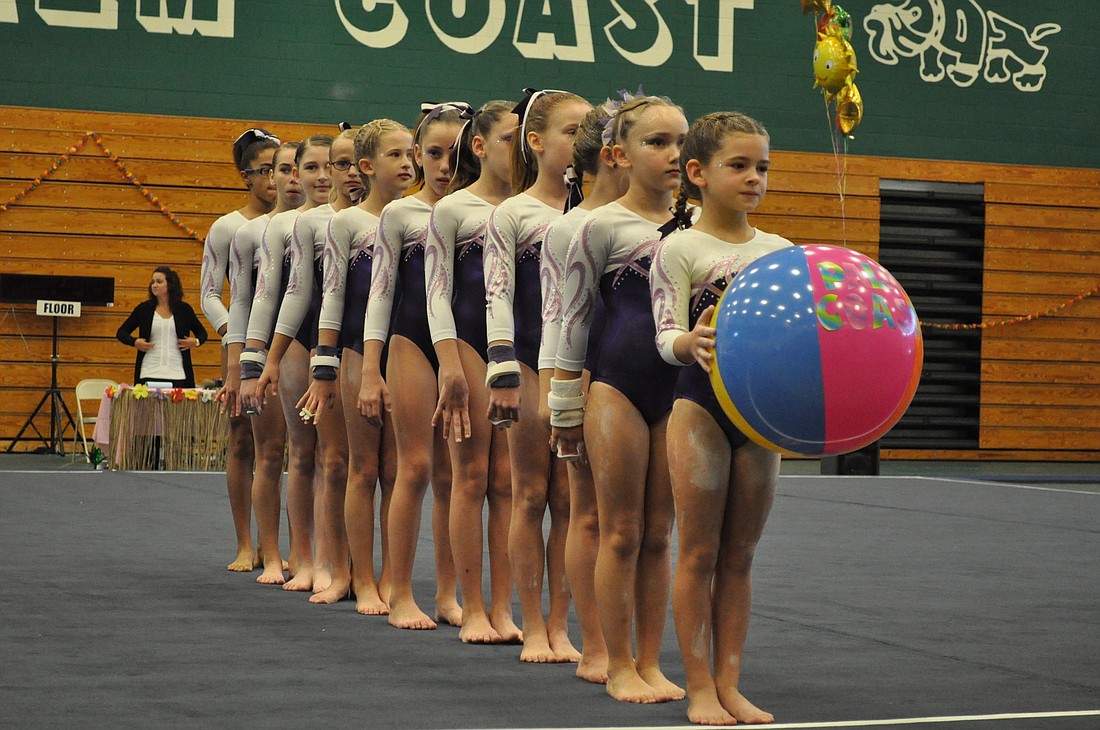 The Palm Coast Gymnastics Level 5 team won first place in overall team in SundayÃ¢â‚¬â„¢s competition of the Summer Salt Invite, held at Flagler Palm Coast High School.