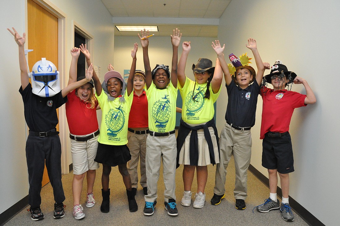 Harry Anthony, Sera Tenzek, Cimone Williams, Mark Paraskiv, Demetrius Headley, Sophia Mikos, Michael Kozorezov and Lucas Cooper show off their crazy hats.