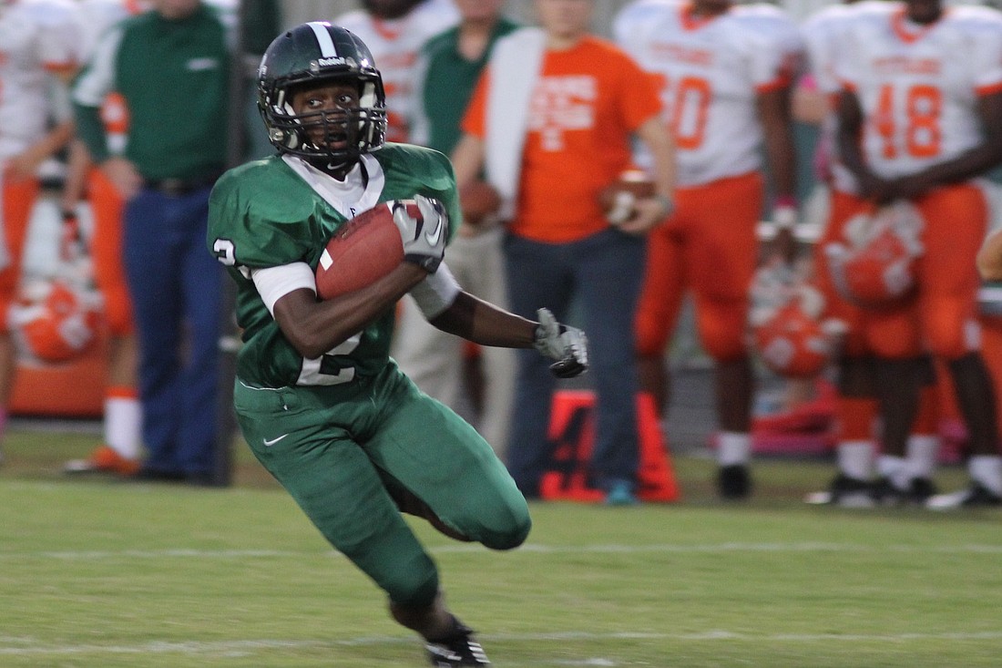 FPC running back Jimmie Robinson had 11 carries for 80 yards Friday night, leading the Bulldogs past University, 28-7, on Homecoming. SHANNA FORTIER