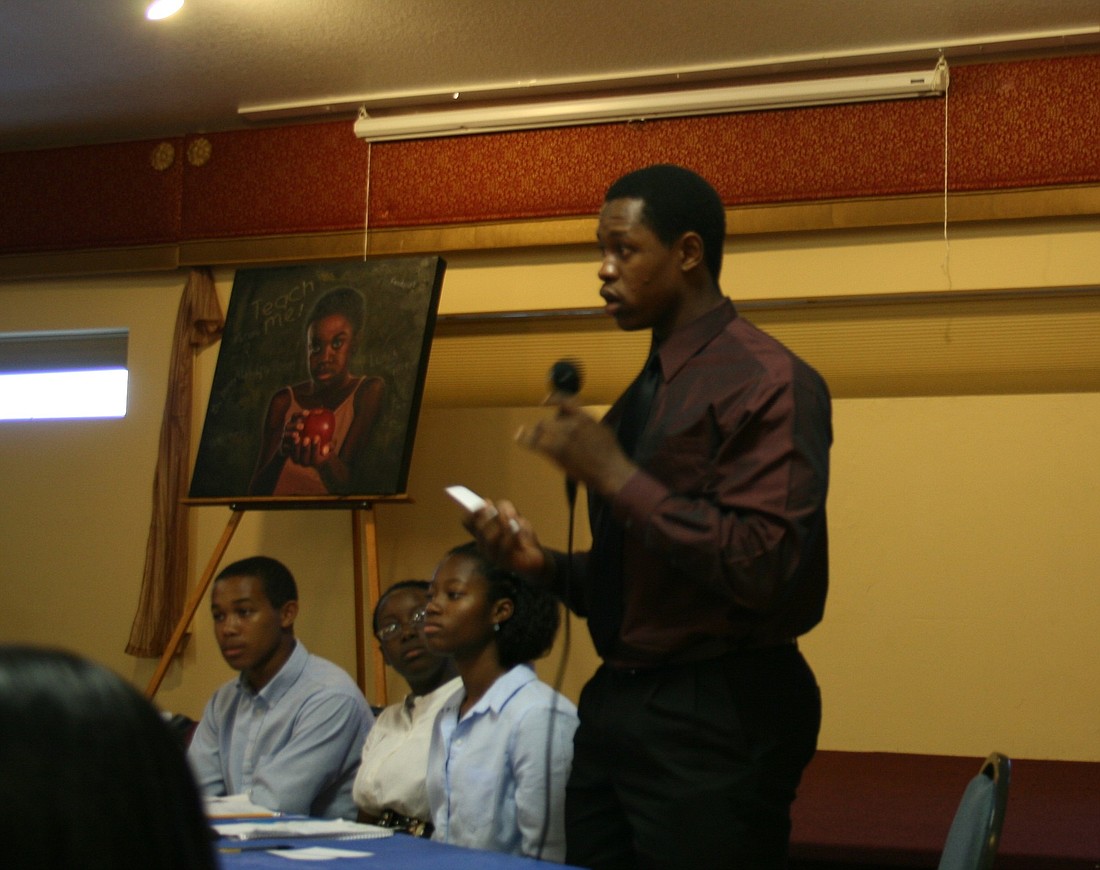 "Small business is what we need to get our economy back on track," said Bryan Dieudonne, 18, at the youth debate. MEGAN HOYE