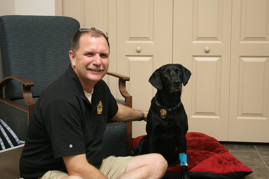 Lt. Brian Smithey and Powder wait to begin stem cell therapy.