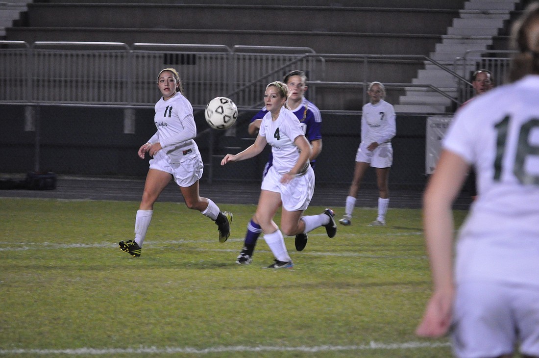 FPC's Victoria Martins (left) and Taylor Gould (right) fight for the ball Wednesday night against Fletcher in the Class 5A regional quarterfinals. PHOTO BY ANDREW O'BRIEN