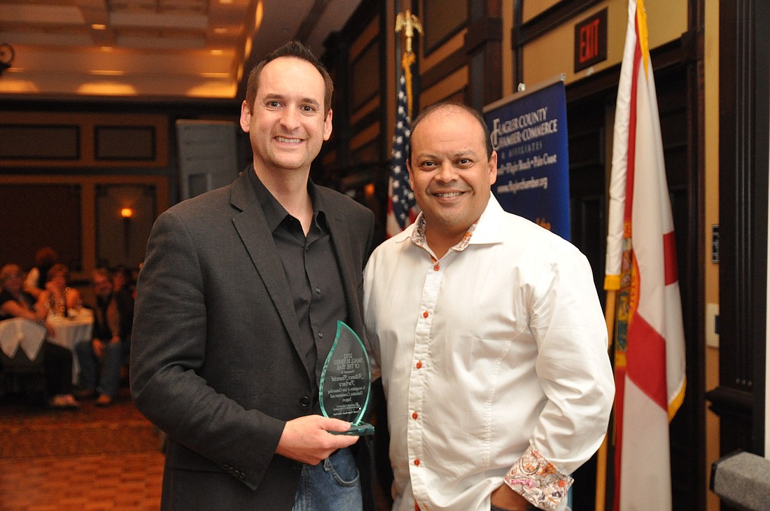 David Fowler and Eddie Herrera, of Alliance Financial partners, Inc., which won Small Business of the Year.