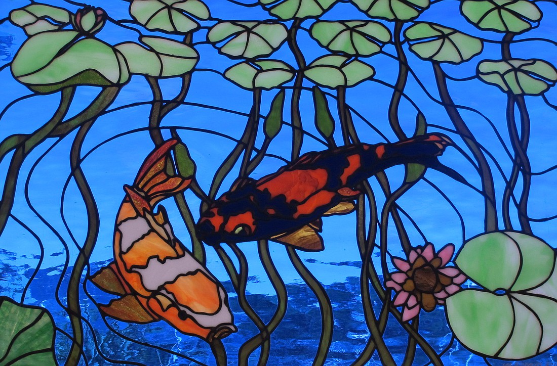 Ã¢â‚¬Å“Koi Fish PondÃ¢â‚¬Â is a stained glass piece by Lee Richard that will hang in the show.