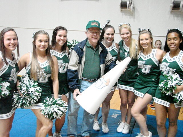 Retired Rev. Harry Usher with the Stetson University cheerleaders