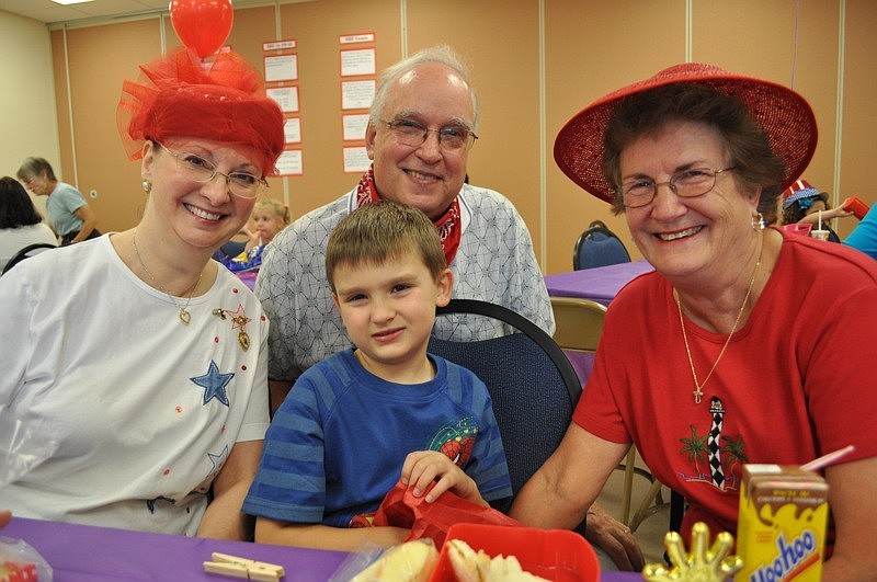 Billy Bartens enjoyed lunch with his grandparents, Patricia and Richard Crispi, left, and Carol Bartens, right.