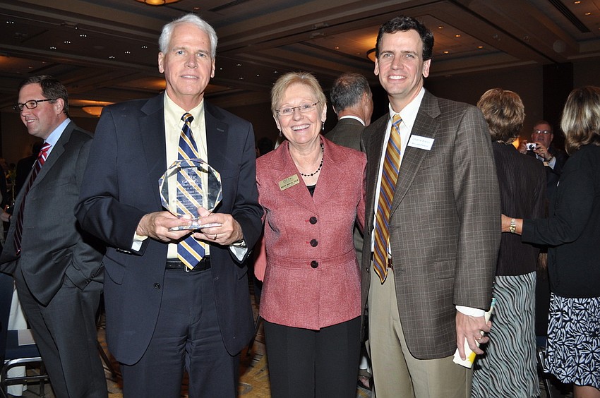 Clyde Nixon Business Leadership Award winner Dan Bailey with Kathy Baylis and Charlie Bailey