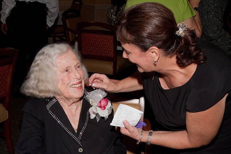 Dorothy Krasner is greeted by Lorrie Britton.