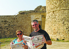Longboaters Suzan and Keith Bickel read The Longboat Observer at Othello's Castle in Famagusta, Cyprus. The trip was part of a longer one that took place this past summer and included Turkey, Greece, and the Greek islands.