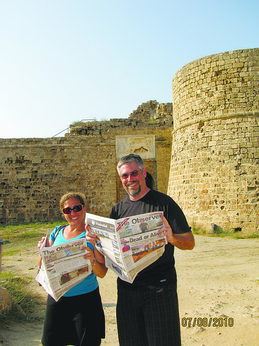 Longboaters Suzan and Keith Bickel read The Longboat Observer at Othello's Castle in Famagusta, Cyprus. The trip was part of a longer one that took place this past summer and included Turkey, Greece, and the Greek islands.