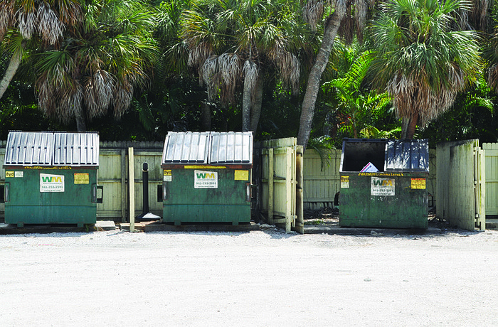 Sandhamn Place residents say dumpsters left open are making a raccoon problem worse in their neighborhood.