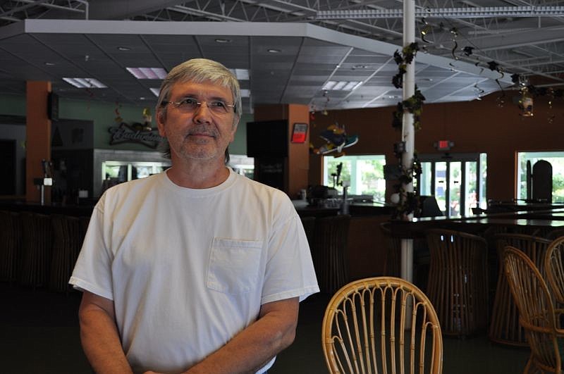 Andrew Hlywa is the owner of Whitney Beach Plaza, which is currently in foreclosure.