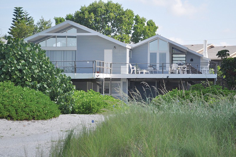 This home at 9247 Blind Pass Road on Siesta Key has three bedrooms, two-and-a-half bedrooms and 2,827 square feet of living area. It sold for $ 1.8 million.