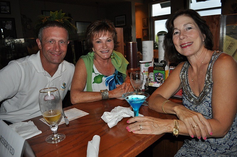 H.J Sauer and his wife Julie, front, enjoyed dinner with Bonnie Mittelstadt.