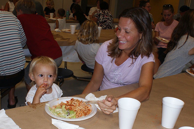 Christi Angelo enjoyed watching her daughter eat.
