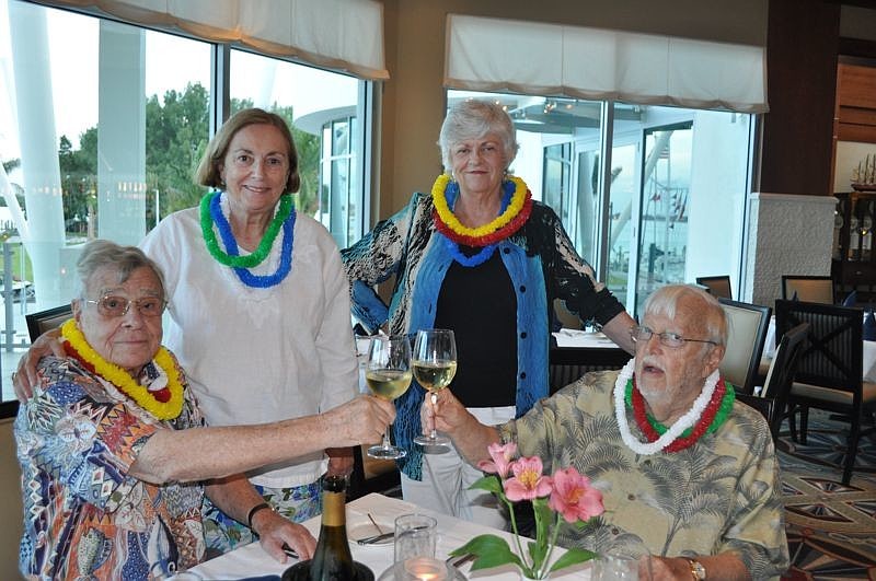 Dean and Barbara Bock and Ingvor and Lynn Tornberg wore leis for the event.