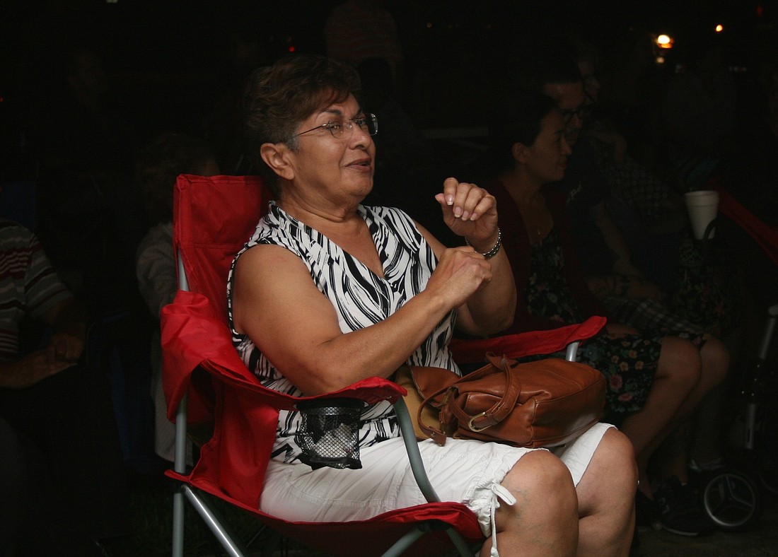 "I'm dying to dance," Eileen Bencosme said, as she listened the music in the park.