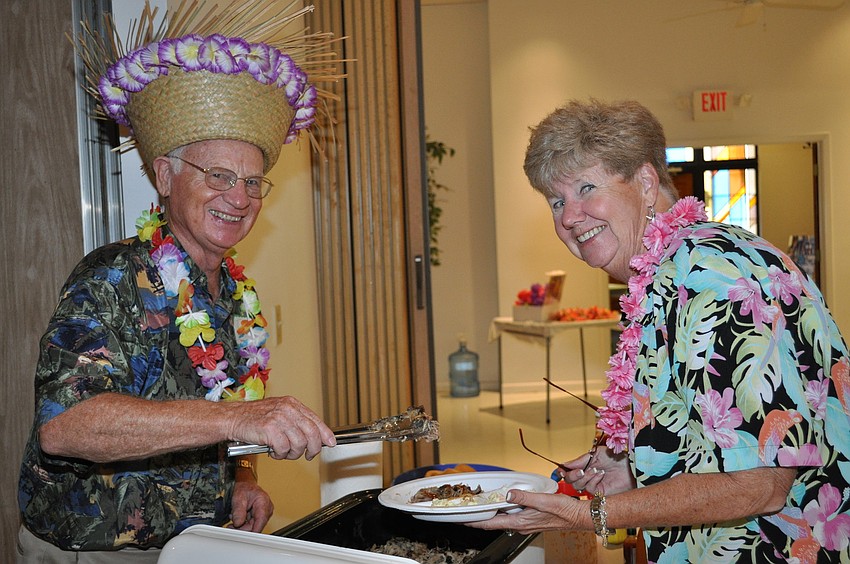 Joe Schmitt serves Margaret Haviland