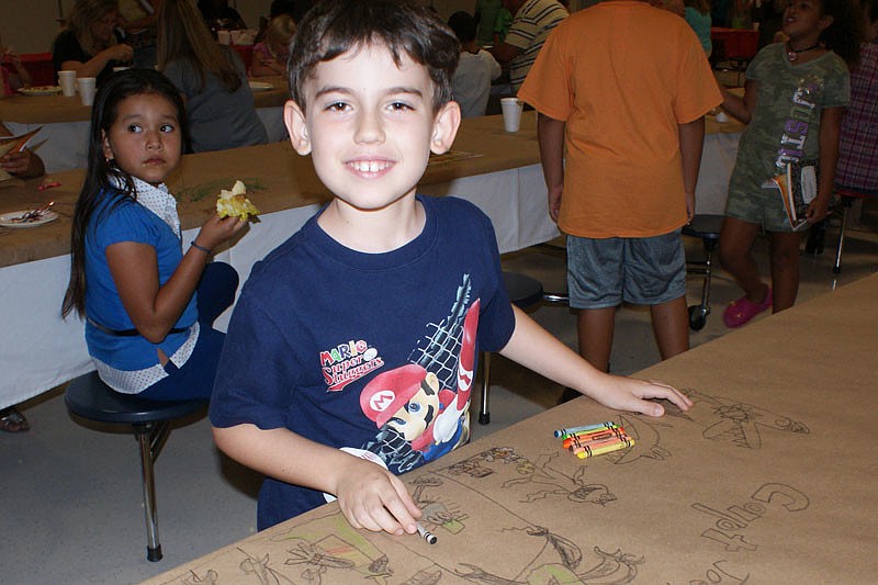 Joey Lavelle, 8, did some amazing artwork on the table.