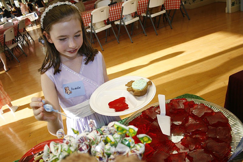 Aoibhin Boles, 7, had a hard time choosing from all the sweet treats.