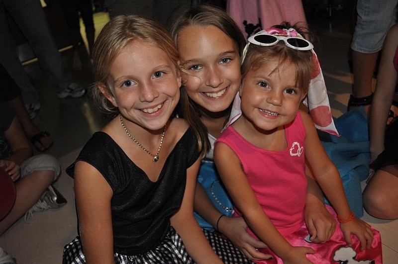 Hayden Gregan, Sarah Blankenship and Issy Monroe watched the hula-hoop contest from the sidelines.