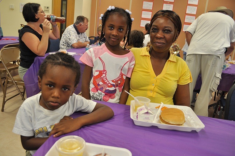 Tamar and Tamya Gibson enjoyed chicken sandwiches with their grandmother Barbara McDowell.